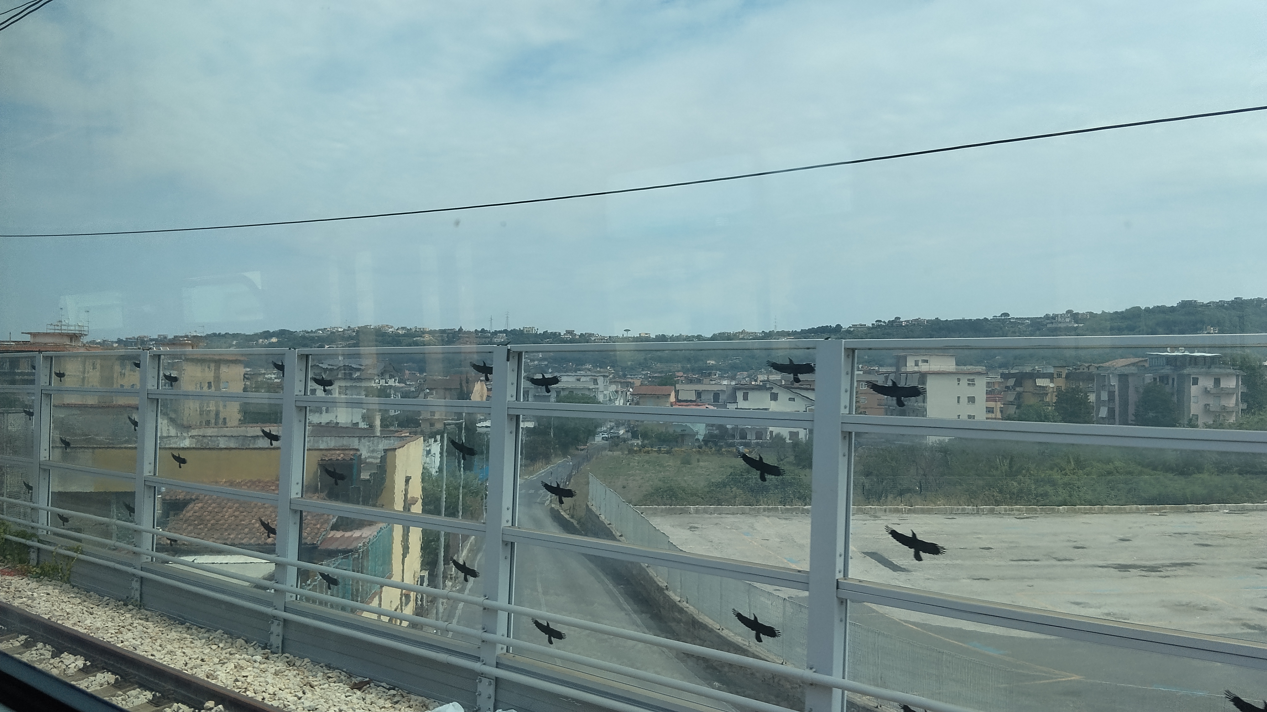 Via Vaiani in Quarto (NA), seen from the railway. In the background, part of the small but long green skyline of Quarto Via Vaiani in Quarto (NA), seen from the railway. In the background, part of the small but long green skyline of Quarto