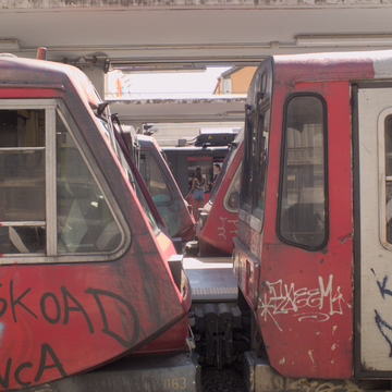 Two FE220 and T21 trains at Napoli Porta Nolana station on the Circumvesuviana railway