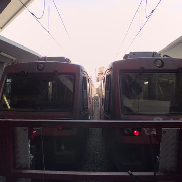 Two FE220 trains at Napoli Porta Nolana station on the Circumvesuviana railway